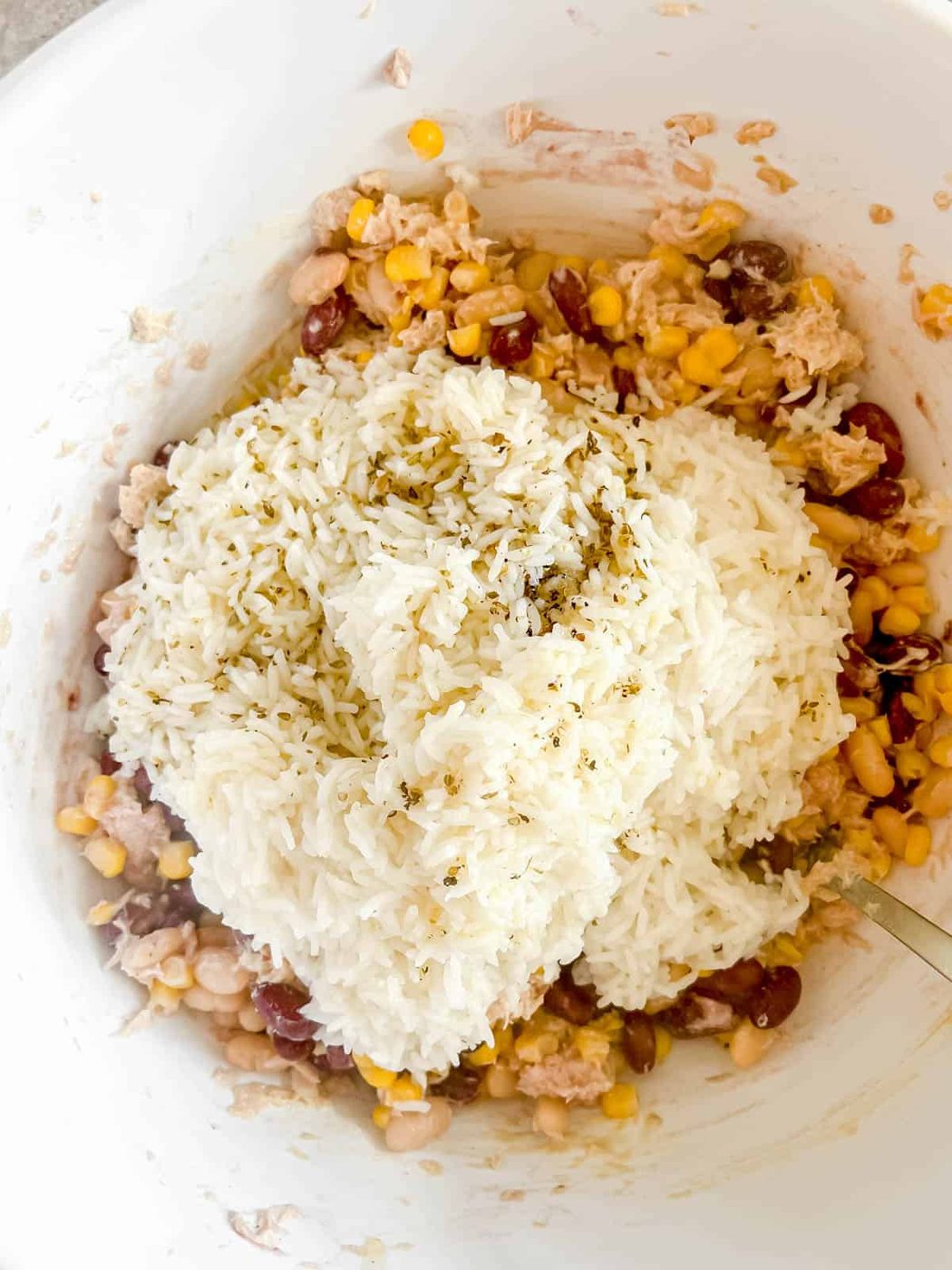Rice added to tuna, corn and beans.