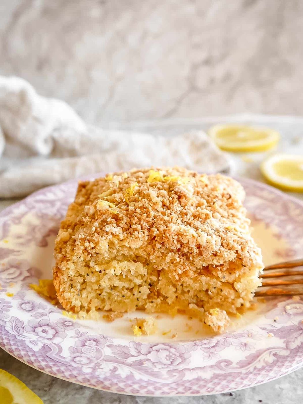 Lemon coffee cake on a plate.