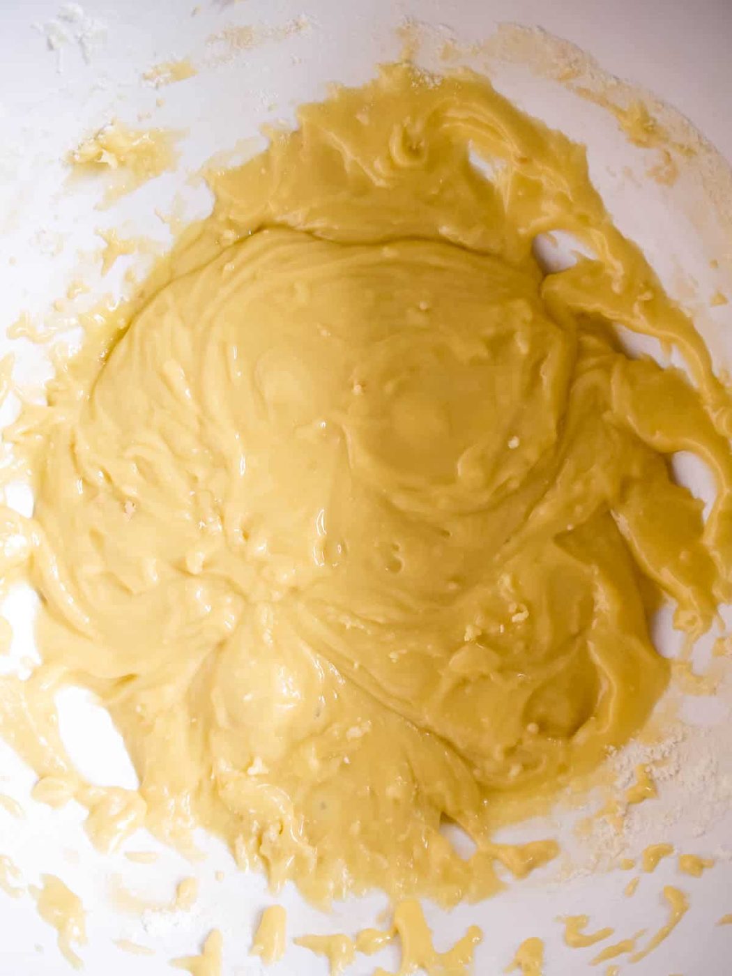 White chocolate brownie batter in a bowl.