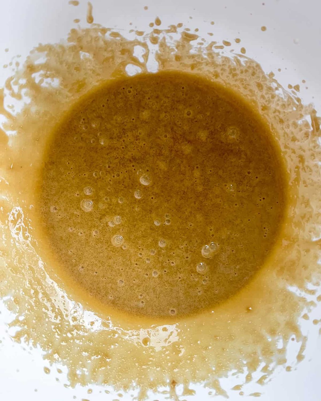 Wet ingredients in a bowl.
