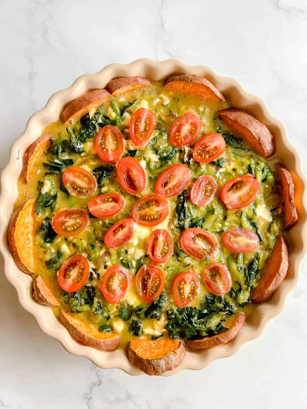 Zucchini and kale sweet potato quiche before baking.
