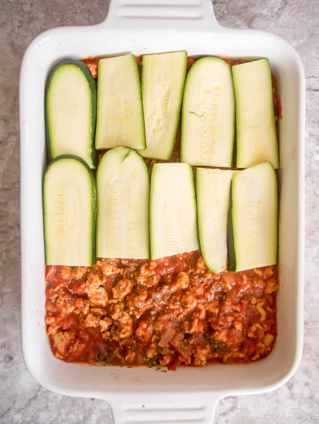 Another slice of zucchini on top.