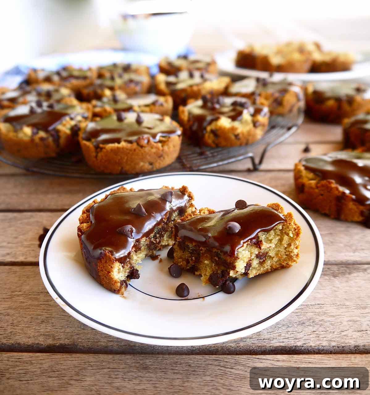 Paleo Chocolate Chip Cookie Cakelets 6 Close-up of a Paleo Chocolate Chip Cookie Cake Cupcake with a generous swirl of chocolate ganache