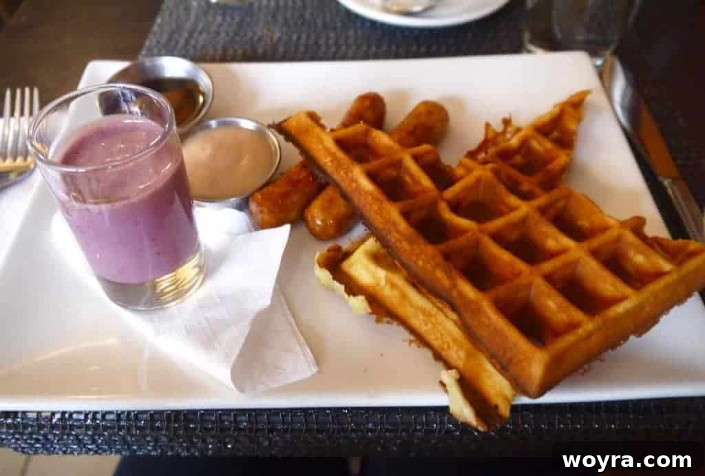 Historic Old Quebec City 26 Delicious maple waffles with apple butter and crispy sausage at Cafe Le Hobbit