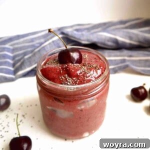 Chocolate Cherry Banana Dream Smoothie 6 Chocolate cherry banana smoothie in a jar with chia seeds on top.
