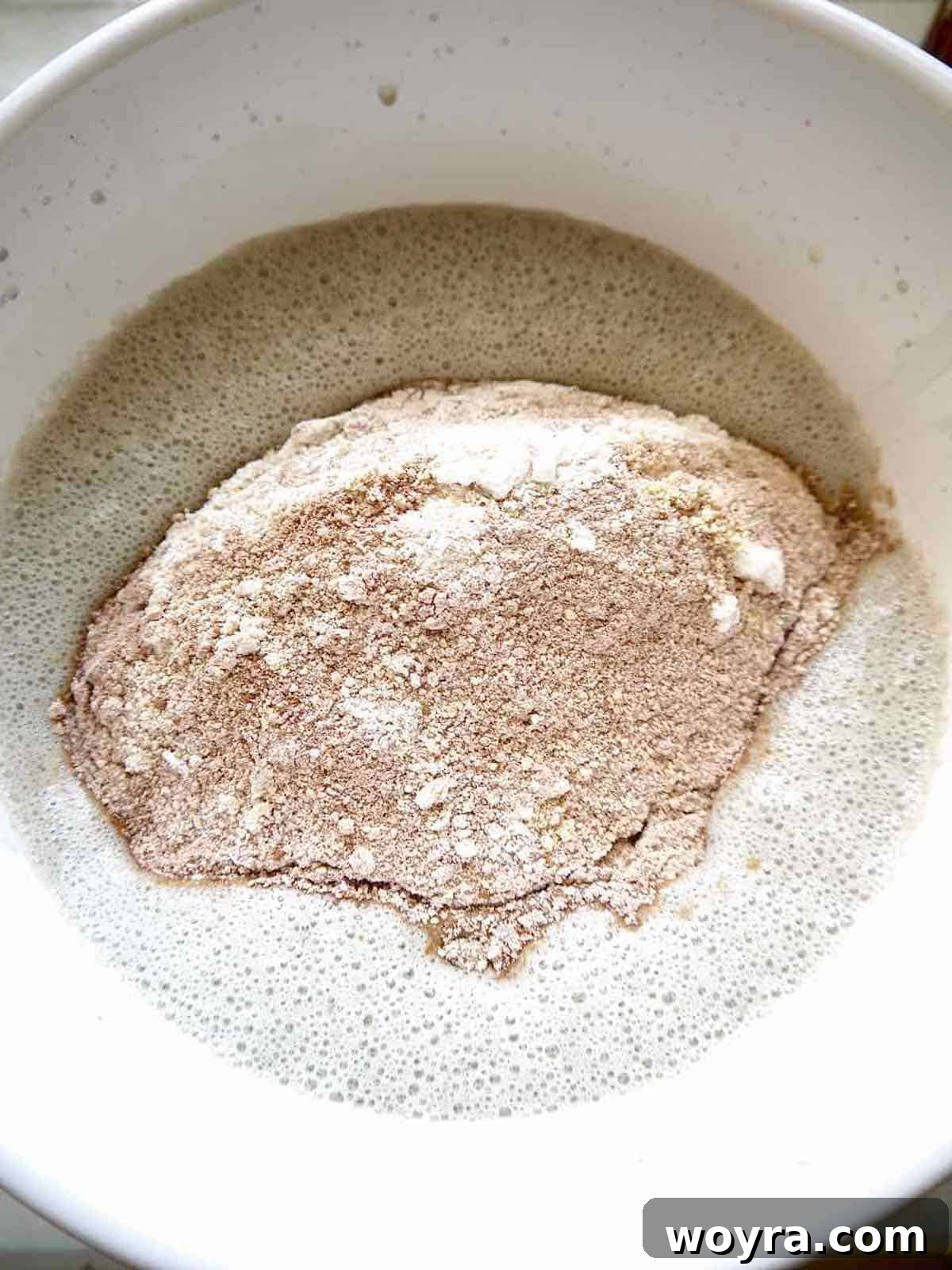 Indulgent Paleo Chocolate Cherry Waffles 5 Dry ingredients for chocolate cherry waffles being mixed, then folded into the wet batter.