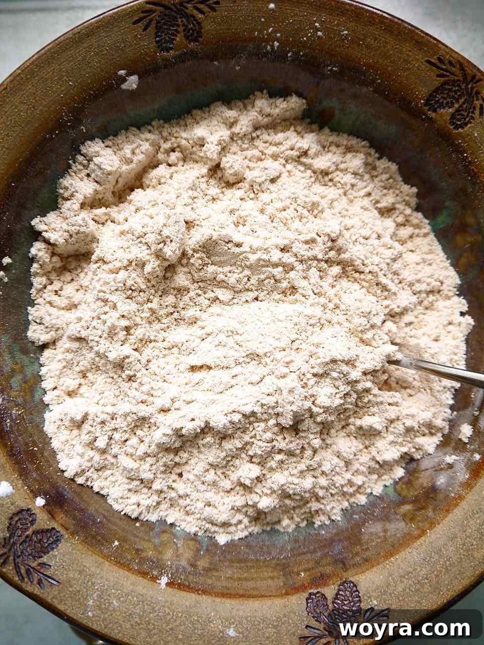 Paleo Apple Almond Cake 4 Dry ingredients for Paleo apple cake measured in a bowl.