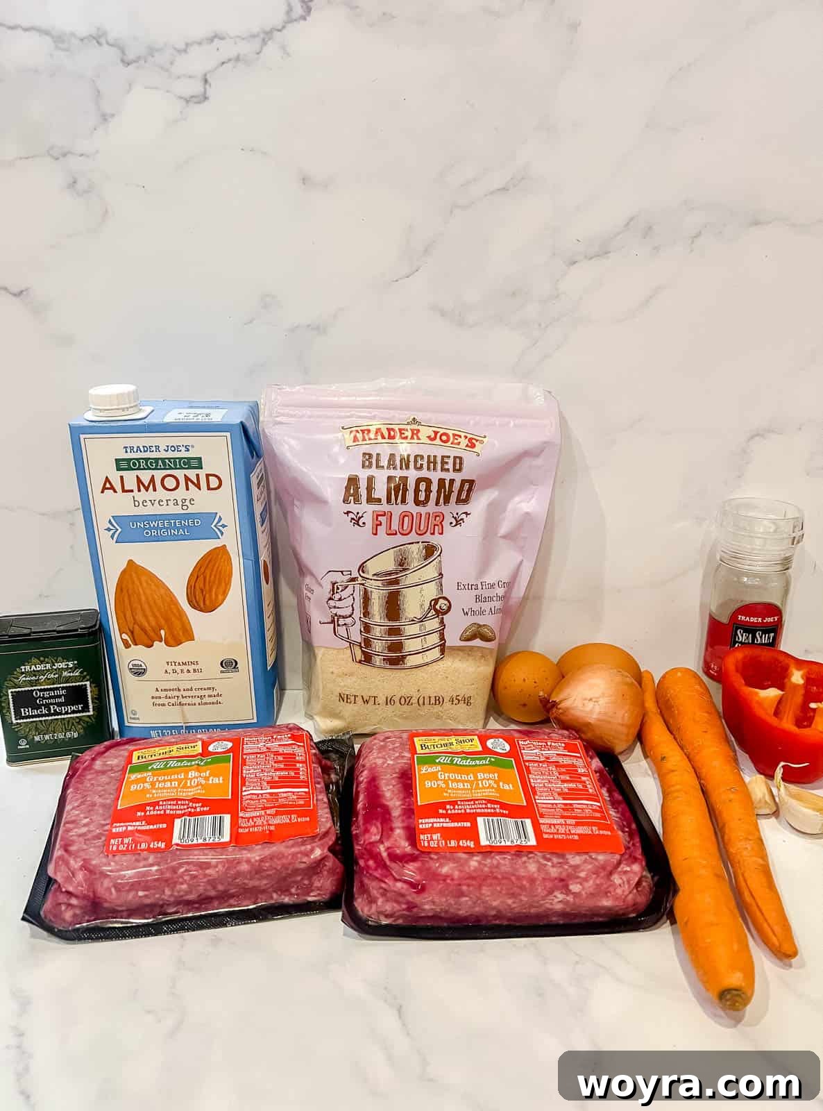 Clean Paleo Meatloaf 5 Ingredients laid out for the paleo meatloaf mixture.