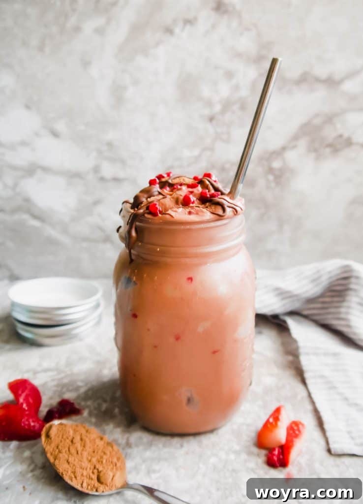 Hidden Gem Chocolate Raspberry Smoothie 5 A vibrant glass of Chocolate Raspberry Cauliflower Smoothie, ready to enjoy.