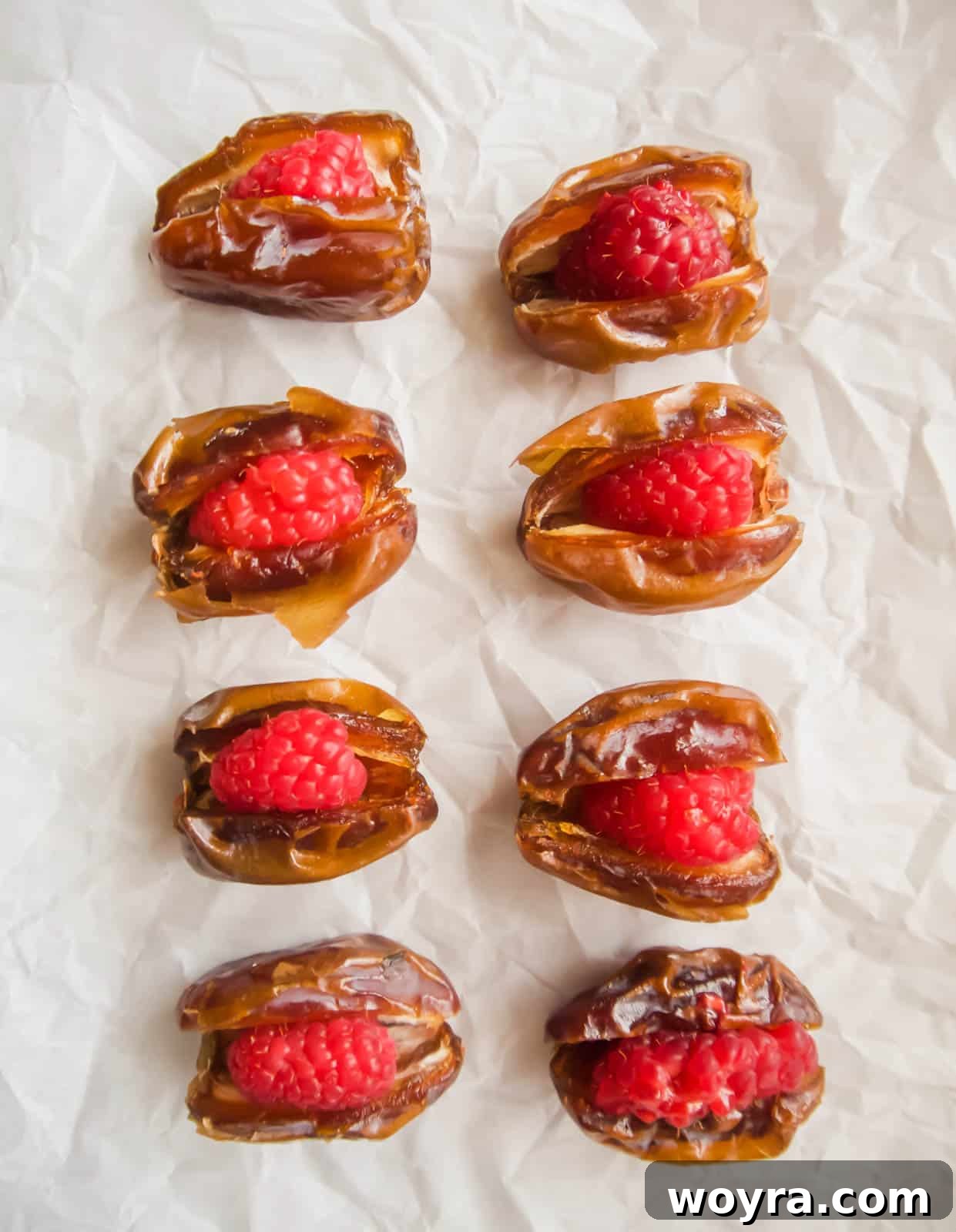 Crispy Bacon-Wrapped Raspberry Stuffed Dates 6 Dates stuffed with raspberries.