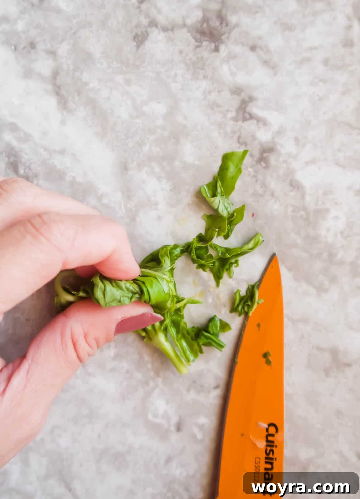 Finely sliced fresh basil leaves.