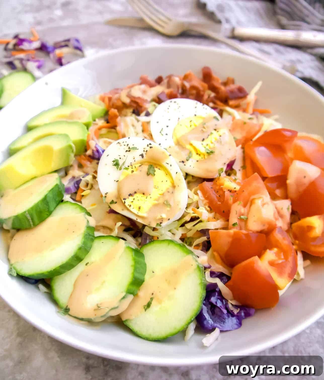 Vibrant Cabbage Slaw 9 A large bowl with the assembled cabbage cobb salad, dressed and mixed.