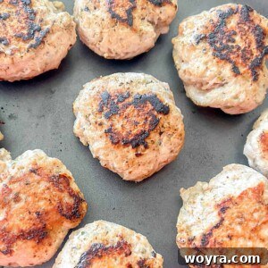 Clean Turkey Sausage Patties (Paleo and Whole30) 8 Turkey sausage patties in a pan after cooking, with a beautiful golden-brown crust.