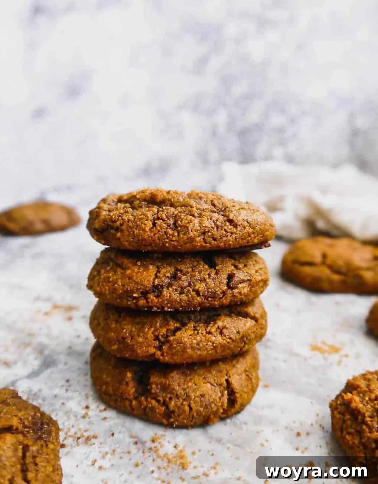 Paleo Pumpkin Spice Molasses Cookies 2 Paleo pumpkin molasses cookies stacked on top of each other.