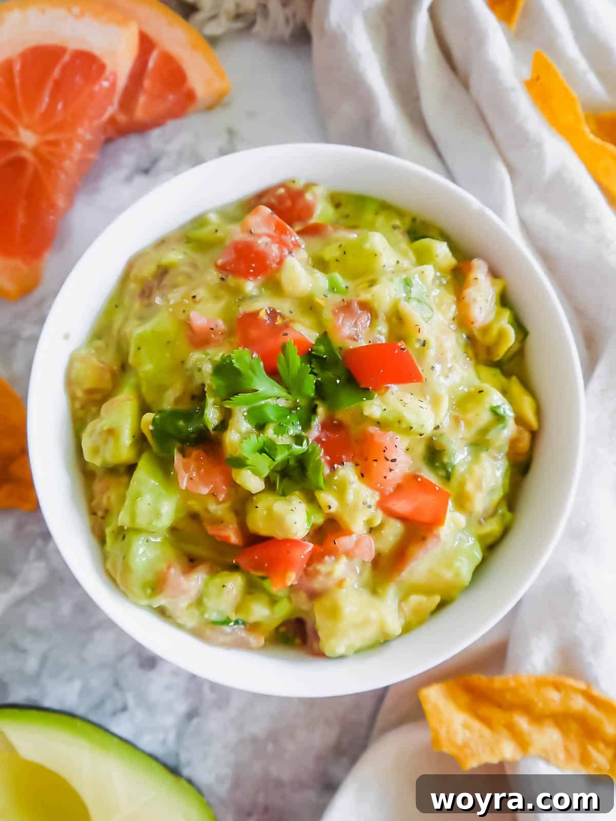 Freshly made Grapefruit Guacamole in a stylish ceramic bowl, ready to be served.
