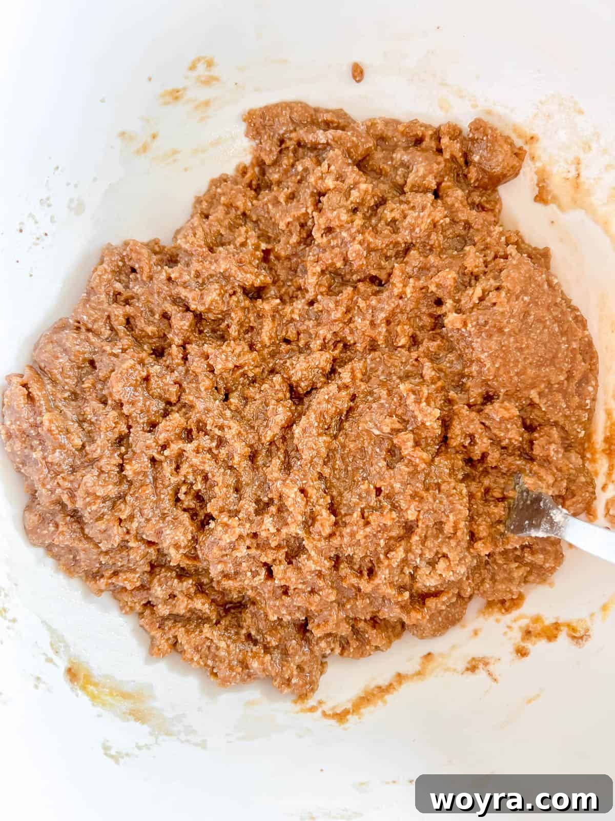 Primal Chocolate Chip Cookie Bars 6 Gluten-free cookie bar dough, a smooth mixture of wet and dry ingredients, ready for chocolate.