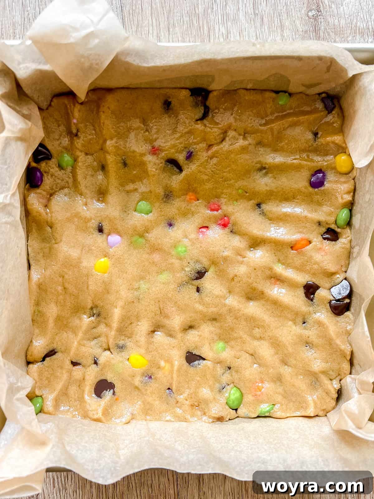 Deliciously Dairy-Free Gluten-Free Chocolate Chip Cookie Bars 8 Gluten free cookie bars dough pressed into a baking pan before baking.