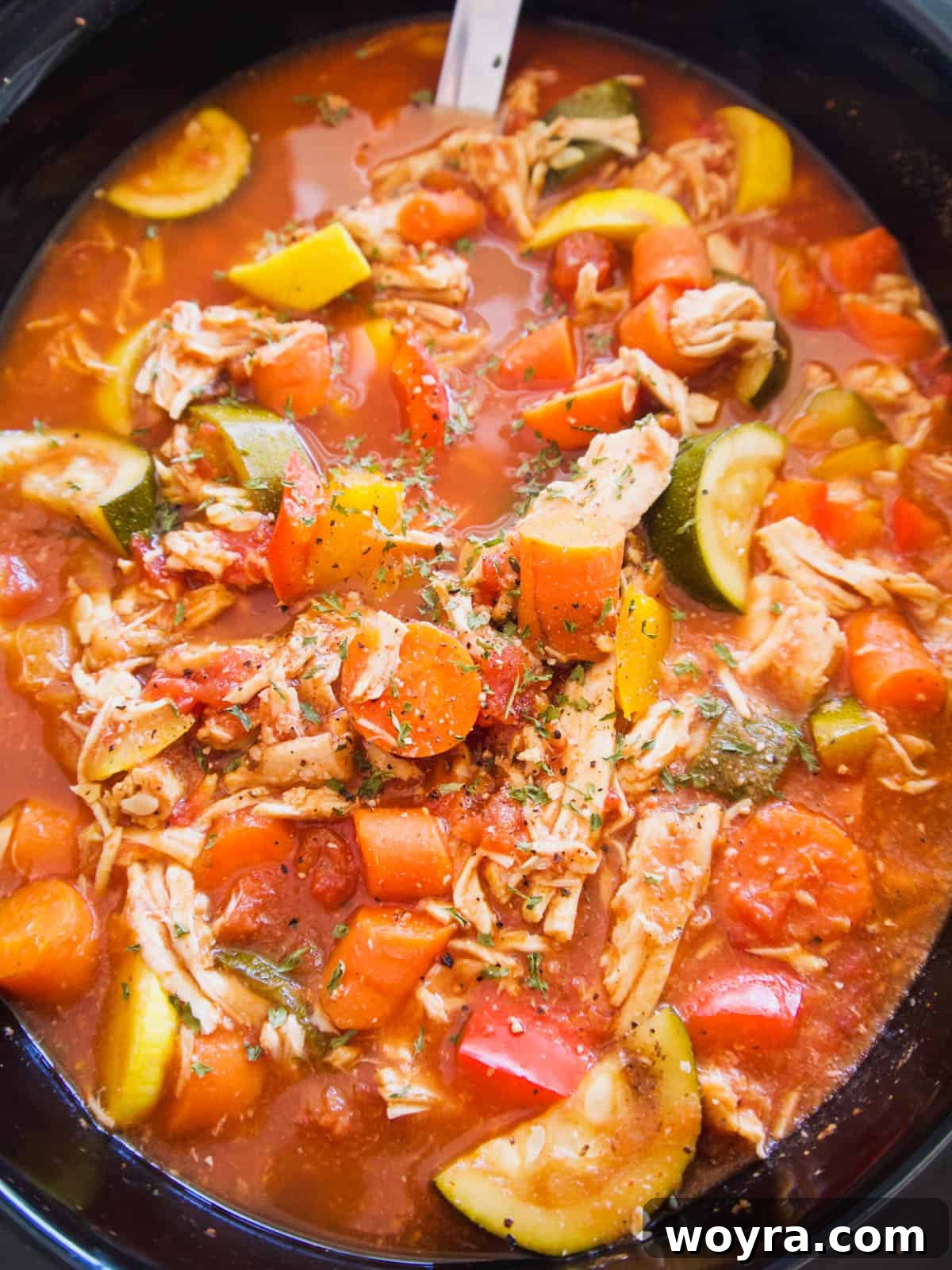 Step-by-step image showing ingredients being added to the slow cooker for shredded chicken chili.