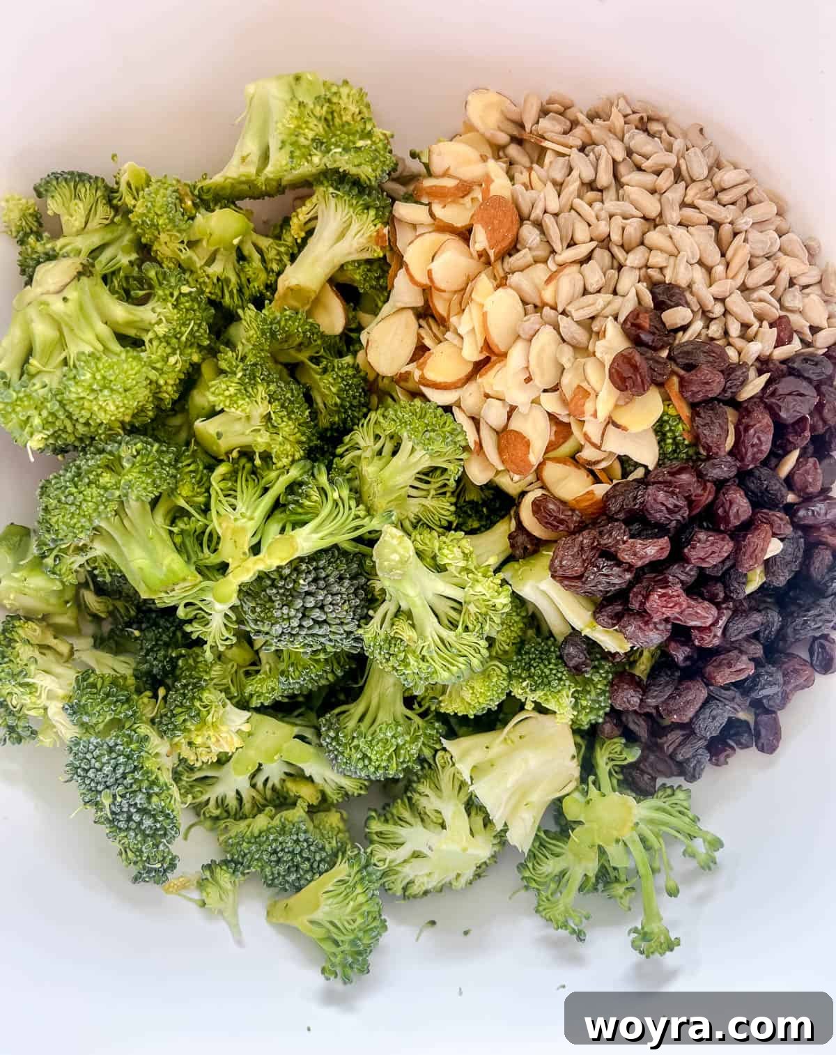 All the parts of the salad in a bowl.