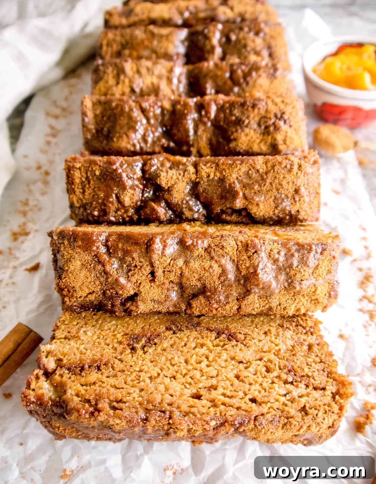 Wholesome Paleo Cinnamon Swirl Pumpkin Banana Bread 2 Delicious slices of Cinnamon Swirl Paleo Pumpkin Banana Bread topped with maple glaze, a perfect gluten-free and dairy-free treat.
