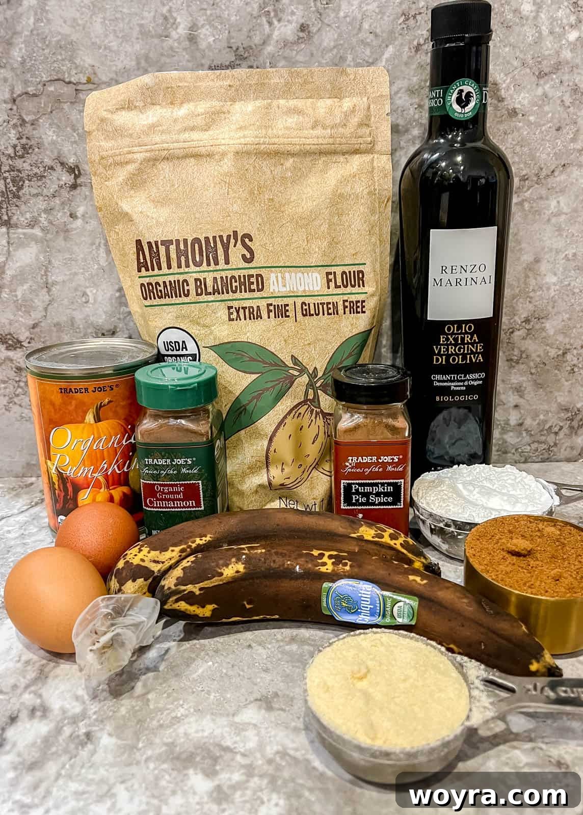 Wholesome Paleo Cinnamon Swirl Pumpkin Banana Bread 4 A flat lay image showing all the healthy, gluten-free, and dairy-free ingredients needed for Paleo pumpkin banana bread.