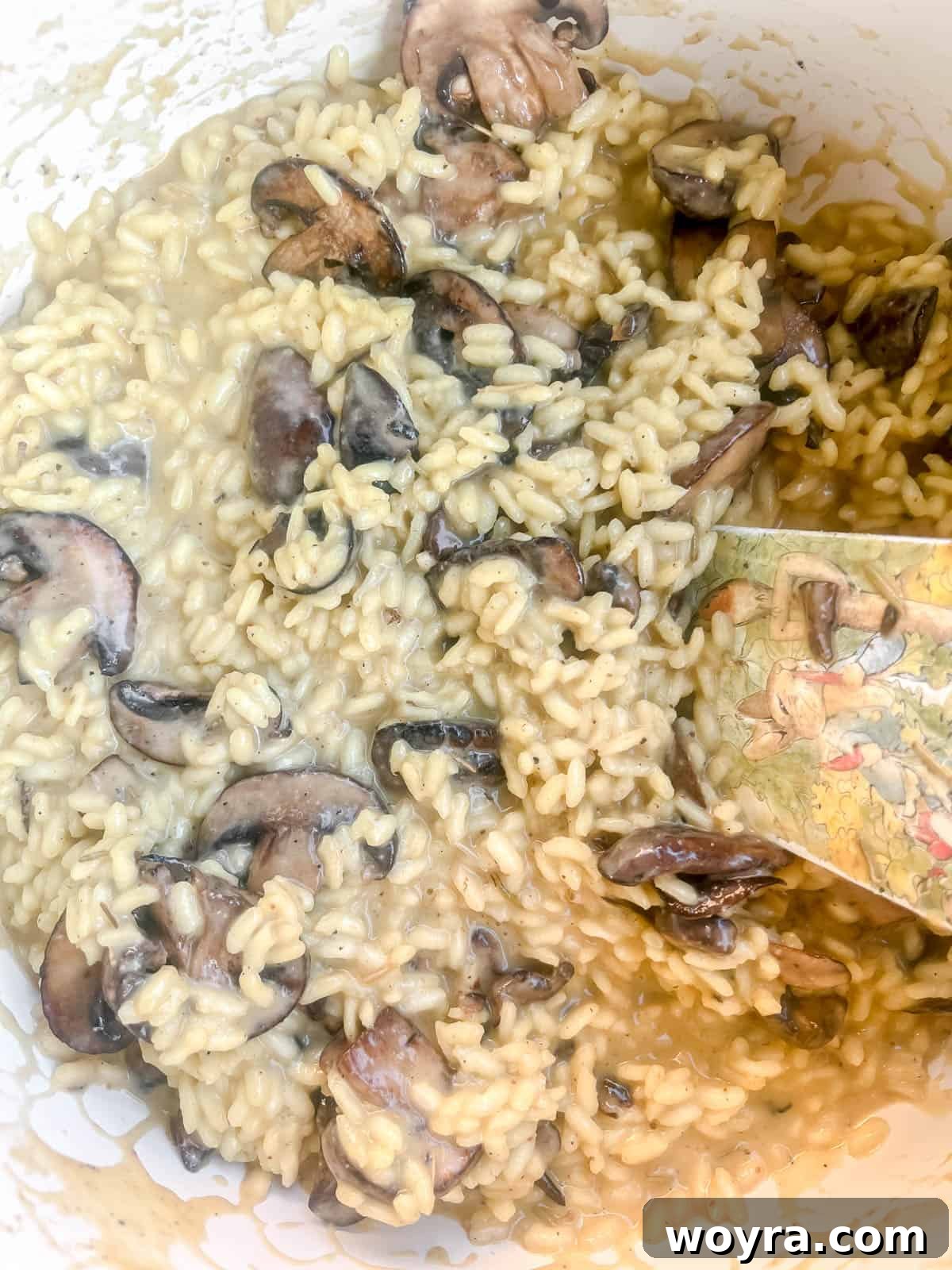 Finished dairy-free mushroom risotto in a cooking pot.