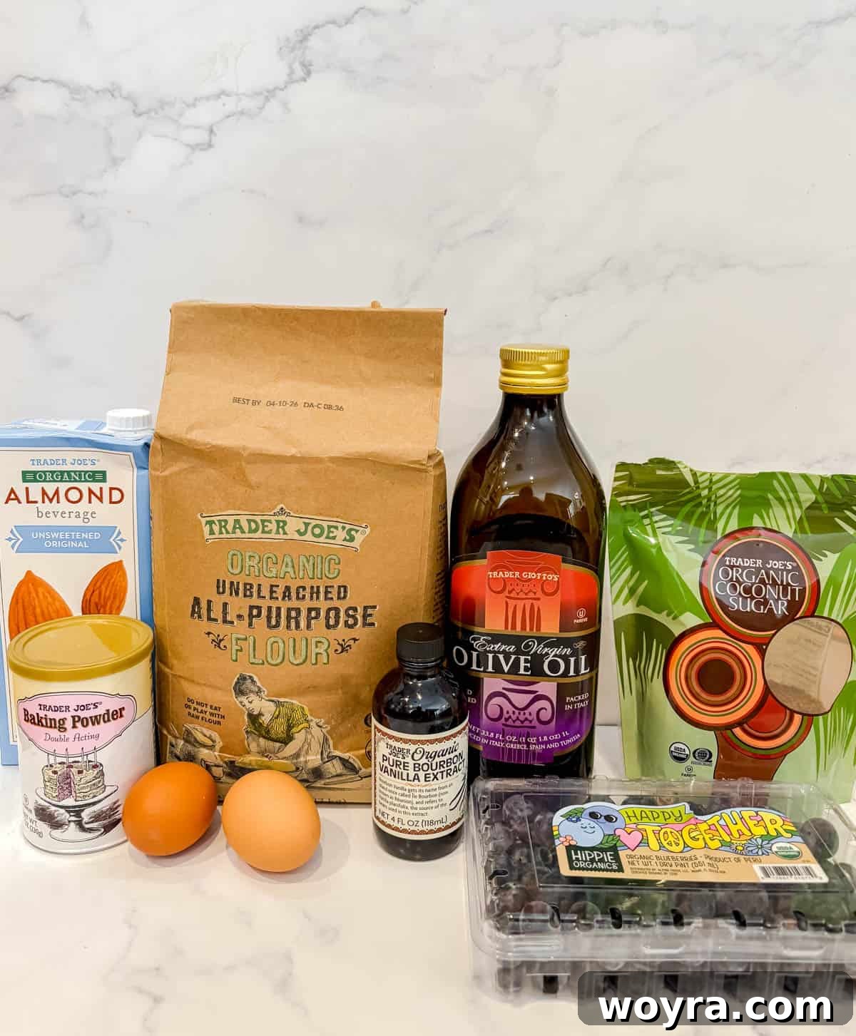 Dairy Free Olive Oil Blueberry Muffins 3 All the necessary ingredients laid out for making dairy-free blueberry muffins.
