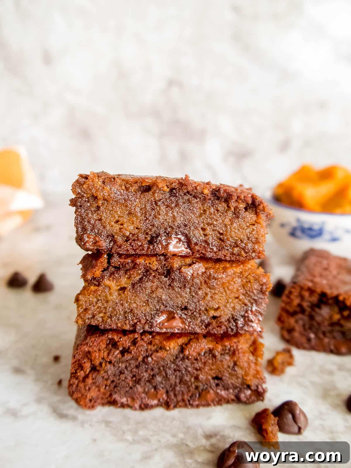 Fudgy Paleo Pumpkin Chocolate Brownies 5 Stacked Paleo and gluten-free pumpkin swirl brownies, showing the beautiful marbled effect.