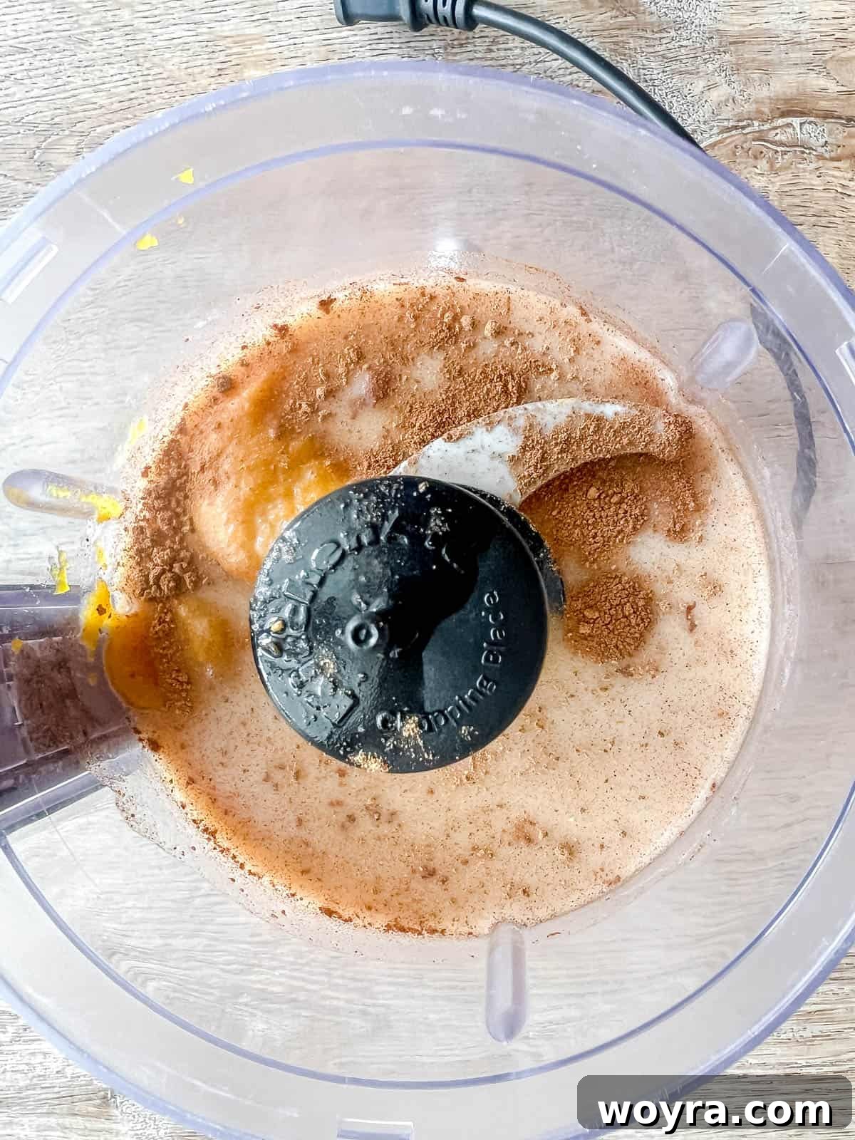 All pumpkin white Russian ingredients in a food processor, ready to blend.