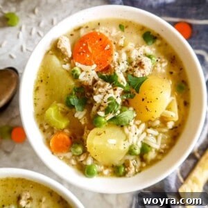 Up close photo of Ground Turkey Soup with rice in a bowl.