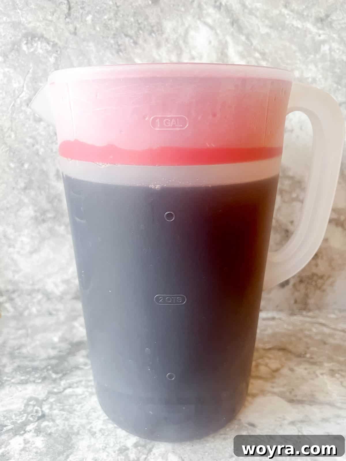 Finished maple iced tea in a pitcher, ready for refrigeration.