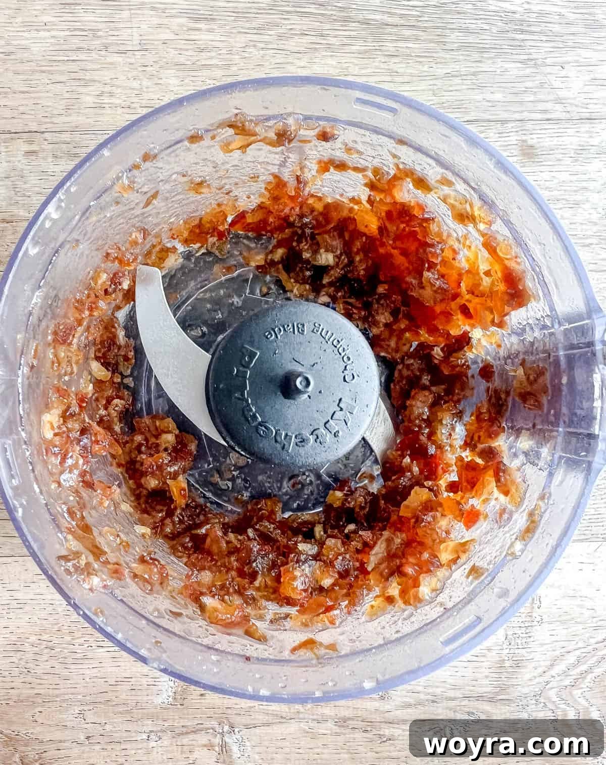 Pitted Medjool dates are placed into a food processor.