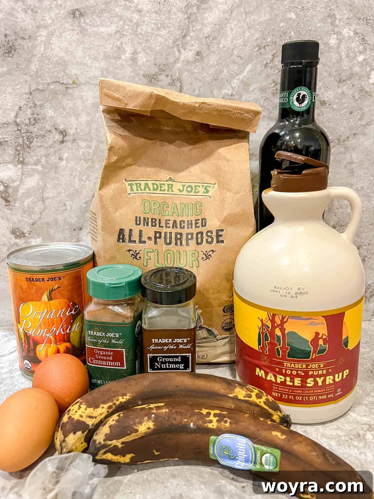 Wholesome Plant-Based Pumpkin Banana Bread 4 Ingredients needed to make healthy pumpkin banana bread laid out on a surface.