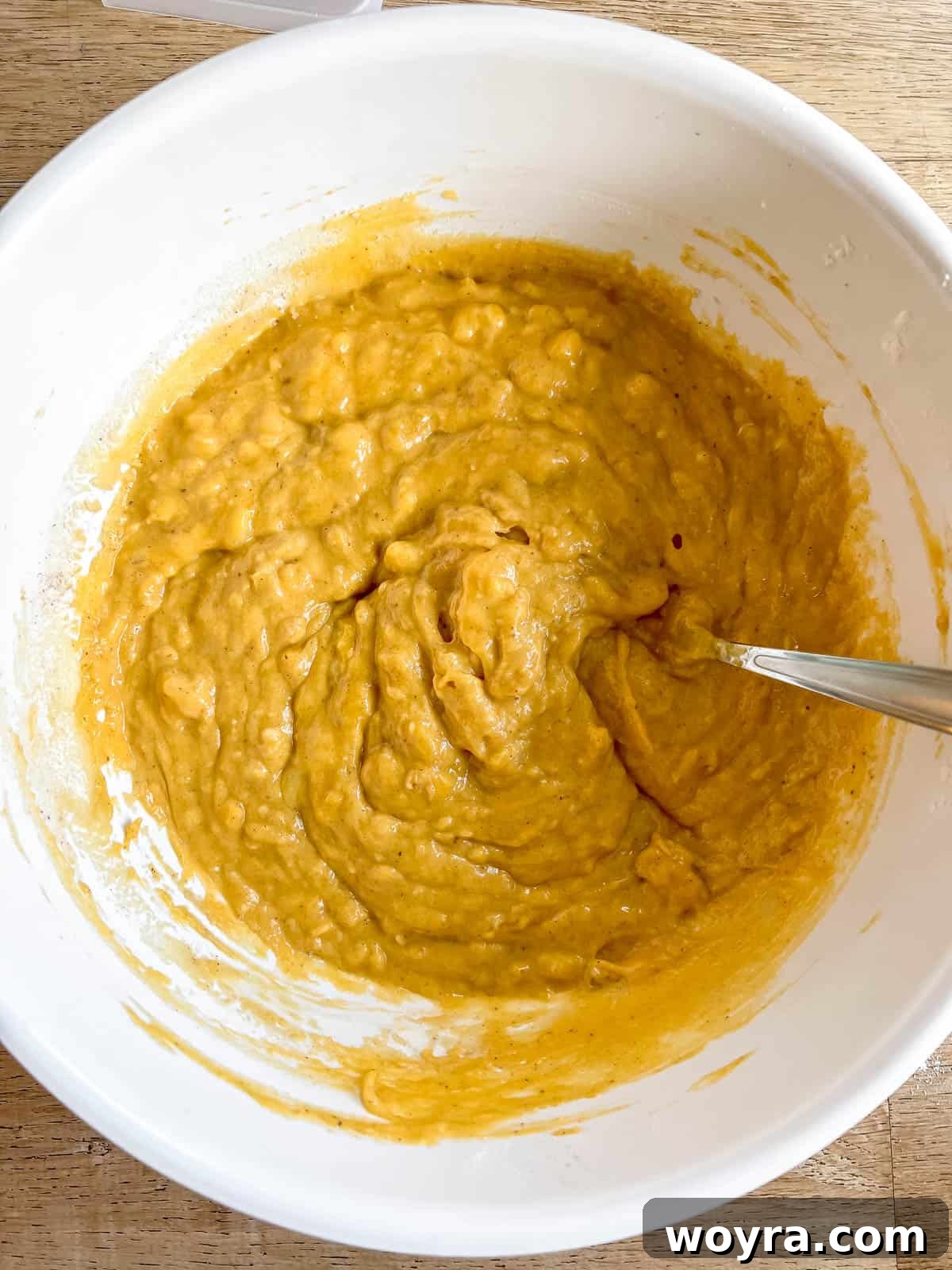 Wholesome Plant-Based Pumpkin Banana Bread 7 Pumpkin banana bread batter fully mixed in a bowl.