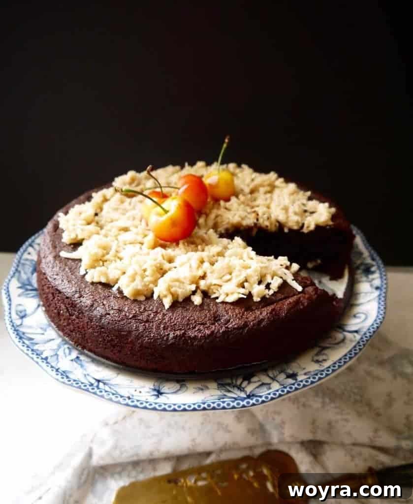 Paleo German Chocolate Cake 9 The final step: Paleo German Chocolate Cake covered generously with the homemade caramel coconut topping.