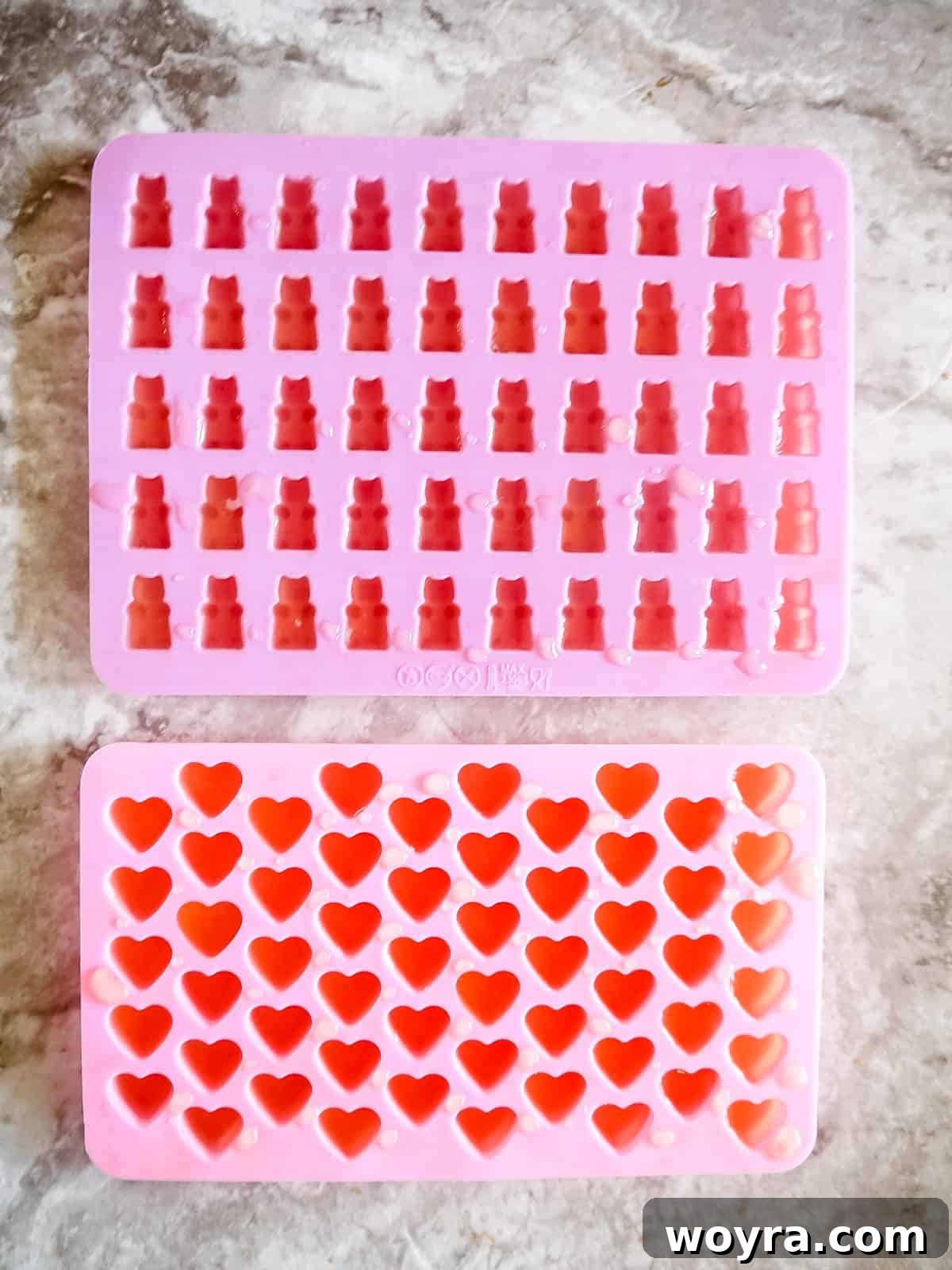 Wholesome Apple Gummy Delights 7 Apple gelatin mixture carefully poured into silicone gummy molds.