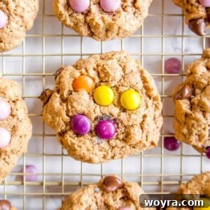 Flourless monster cookies on a cooling rack.