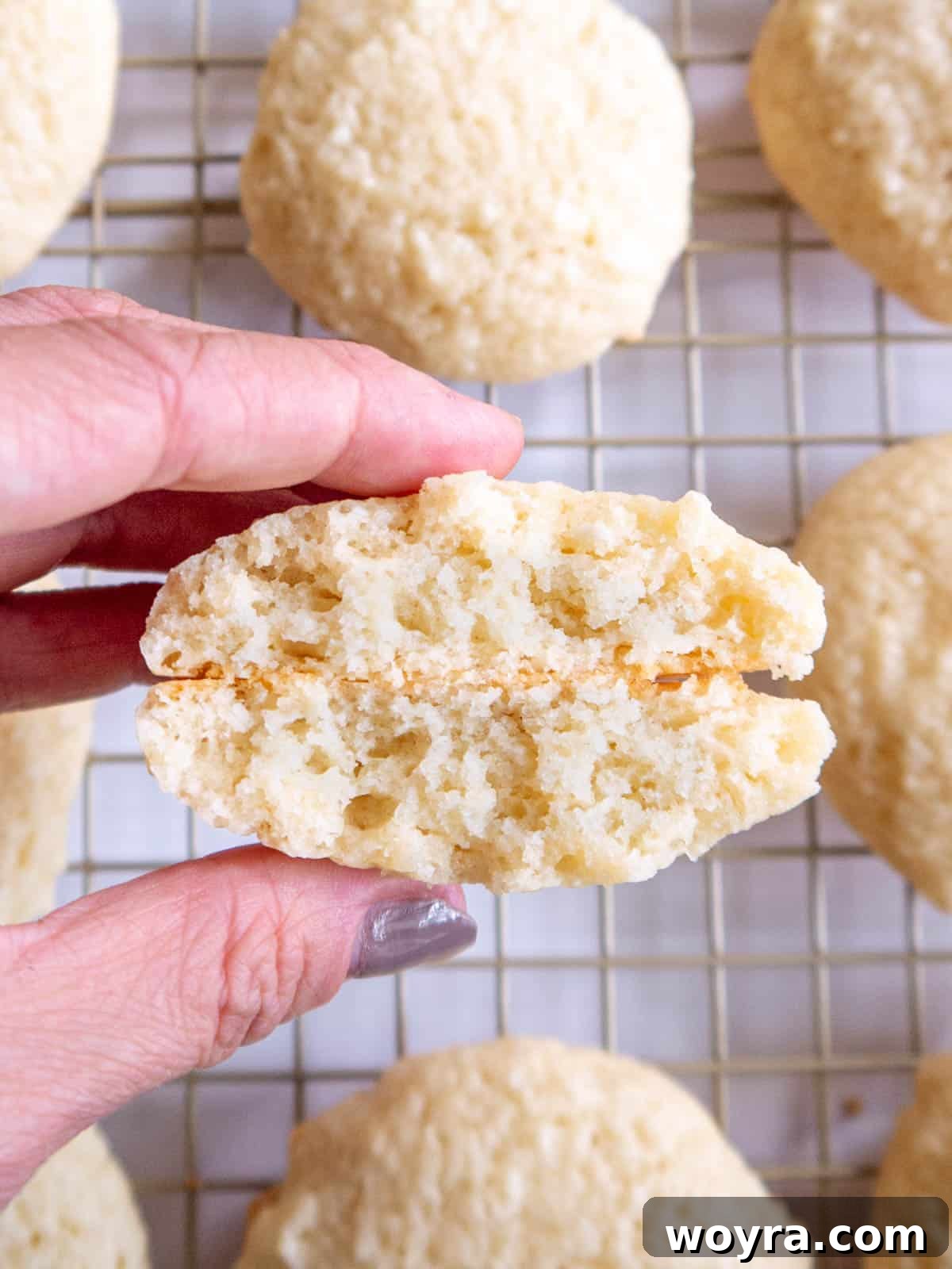 Wholesome Cottage Cheese Cookies 2 A perfectly baked cottage cheese cookie cut in half, revealing its soft, fluffy interior.
