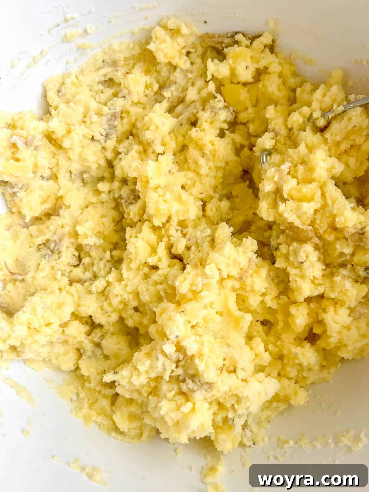 A close-up of finished Greek yogurt mashed potatoes in a bowl, ready to serve.