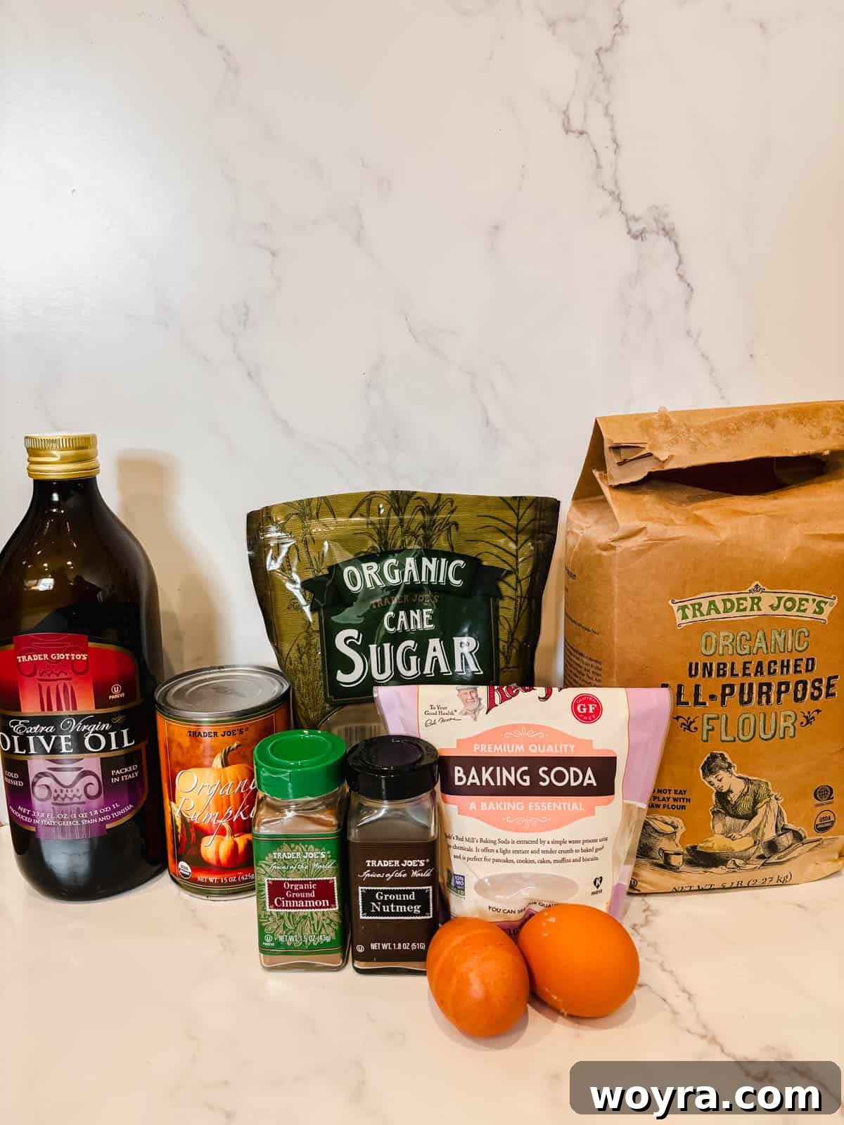 All the necessary ingredients laid out to make delicious dairy-free pumpkin bread.