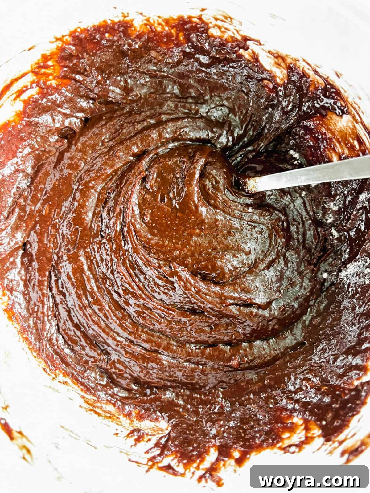 Silky Olive Brownies 8 The smooth, glossy, rich olive oil brownie batter, showcasing its perfect consistency before being transferred to the baking pan.