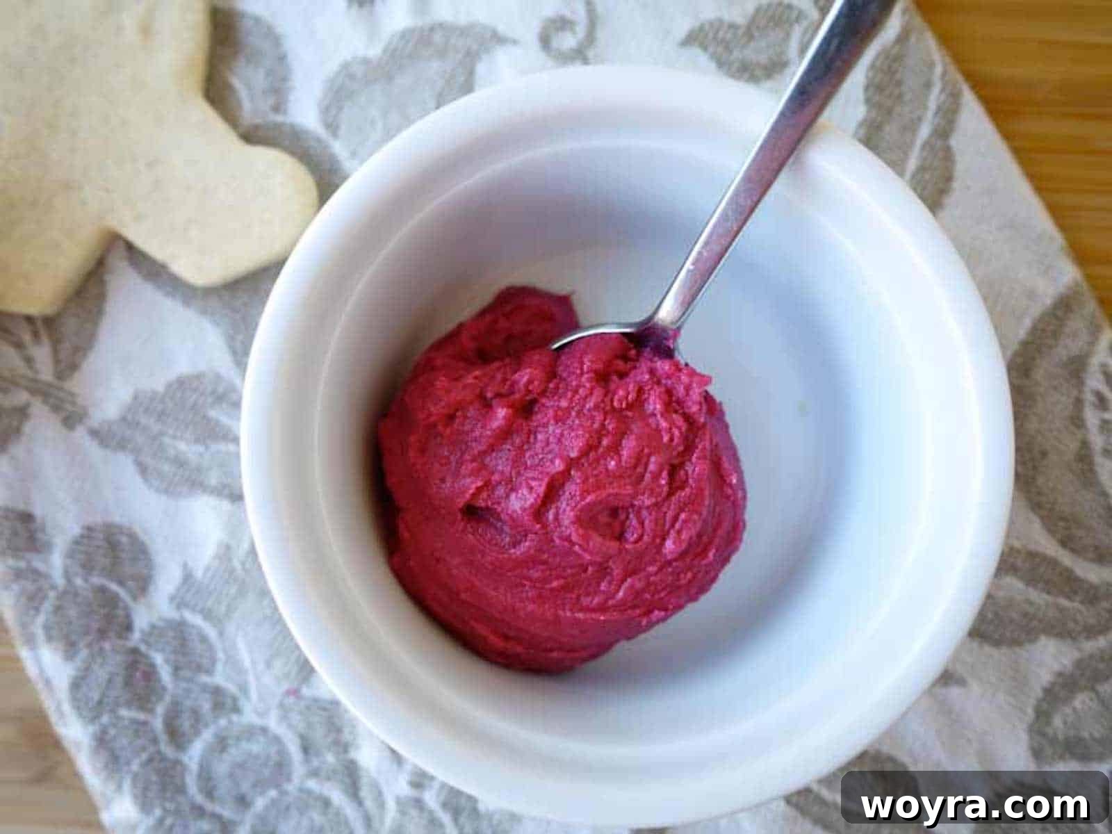 Artfully Shaped Sable Cookies 15 Vibrant pink beet frosting in a bowl.
