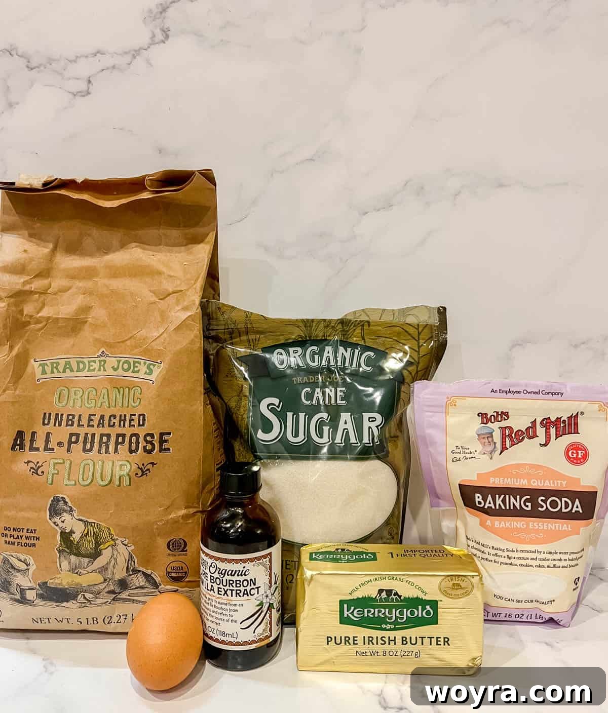 Perfectly Shaped Sable Delights 3 Ingredients needed to make delicious sable cookies, including butter, sugar, flour, egg, vanilla extract, and baking soda.