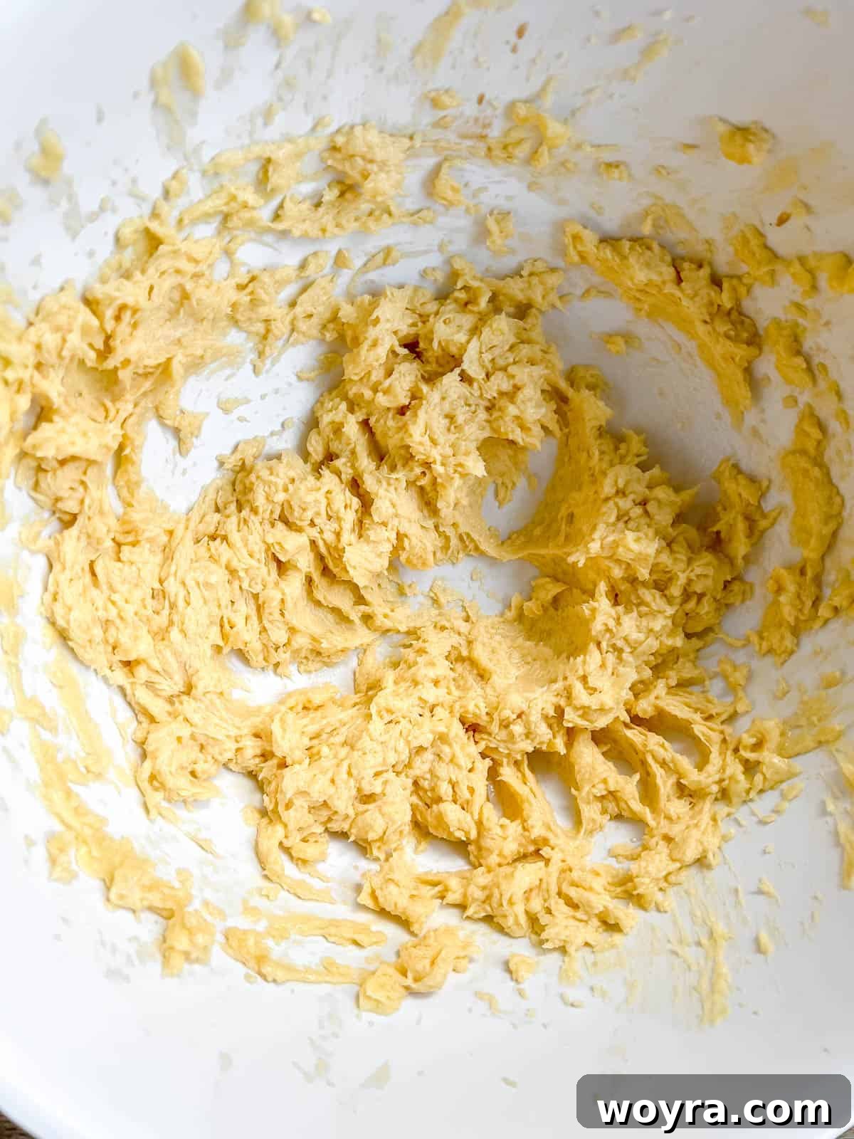 Artfully Shaped Sable Cookies 4 Softened butter and sugar creamed together in a mixing bowl.
