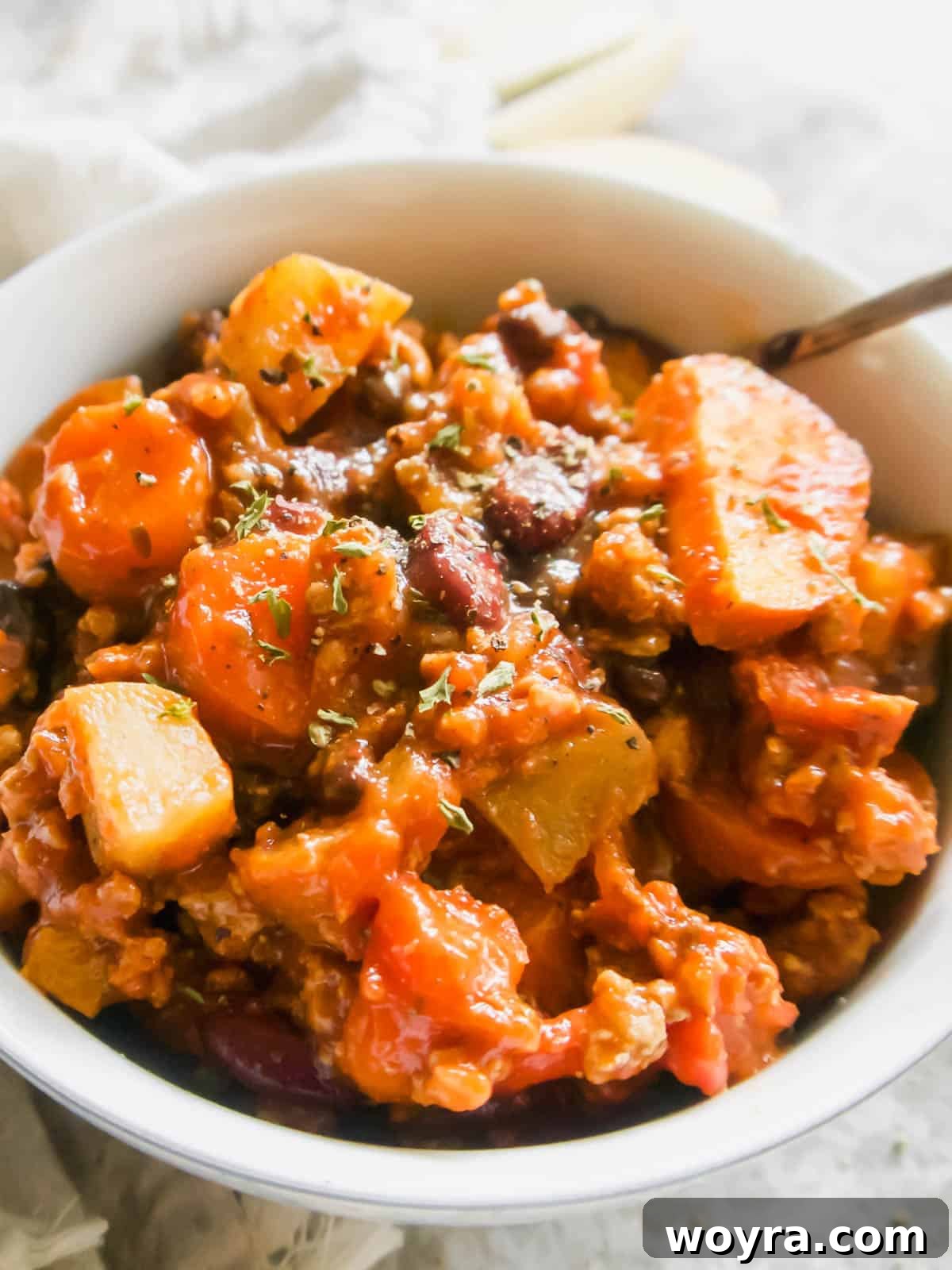 Orchard Spice Turkey Chili 10 A beautiful autumn chili recipe, showcasing the rich colors and textures of turkey, apples, and vegetables.