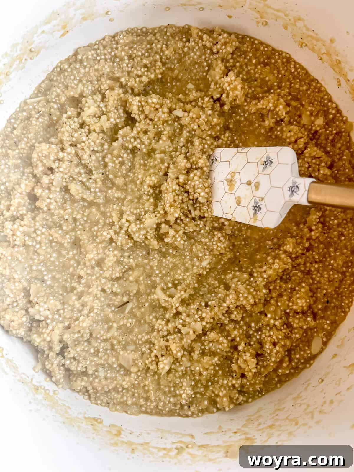 Velvety Mushroom Quinoa Risotto 11 The finished creamy quinoa risotto, showing its thick, absorbed consistency in a large pan.