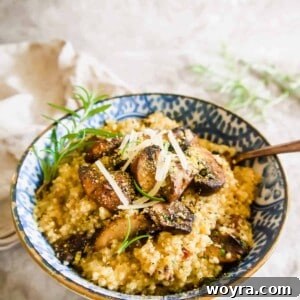 Mushroom Quinoa Risotto in a bowl with Parmesan on top, ready for serving.