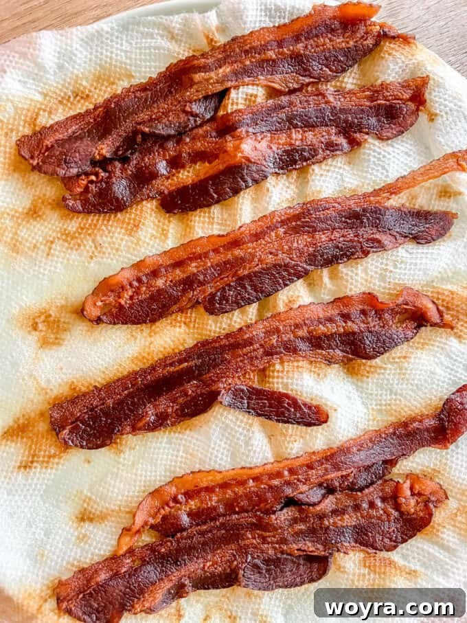 Sweet Potato Bacon Breakfast Nests 3 Crispy bacon slices cooked in the microwave, ready to be crumbled for egg cups.