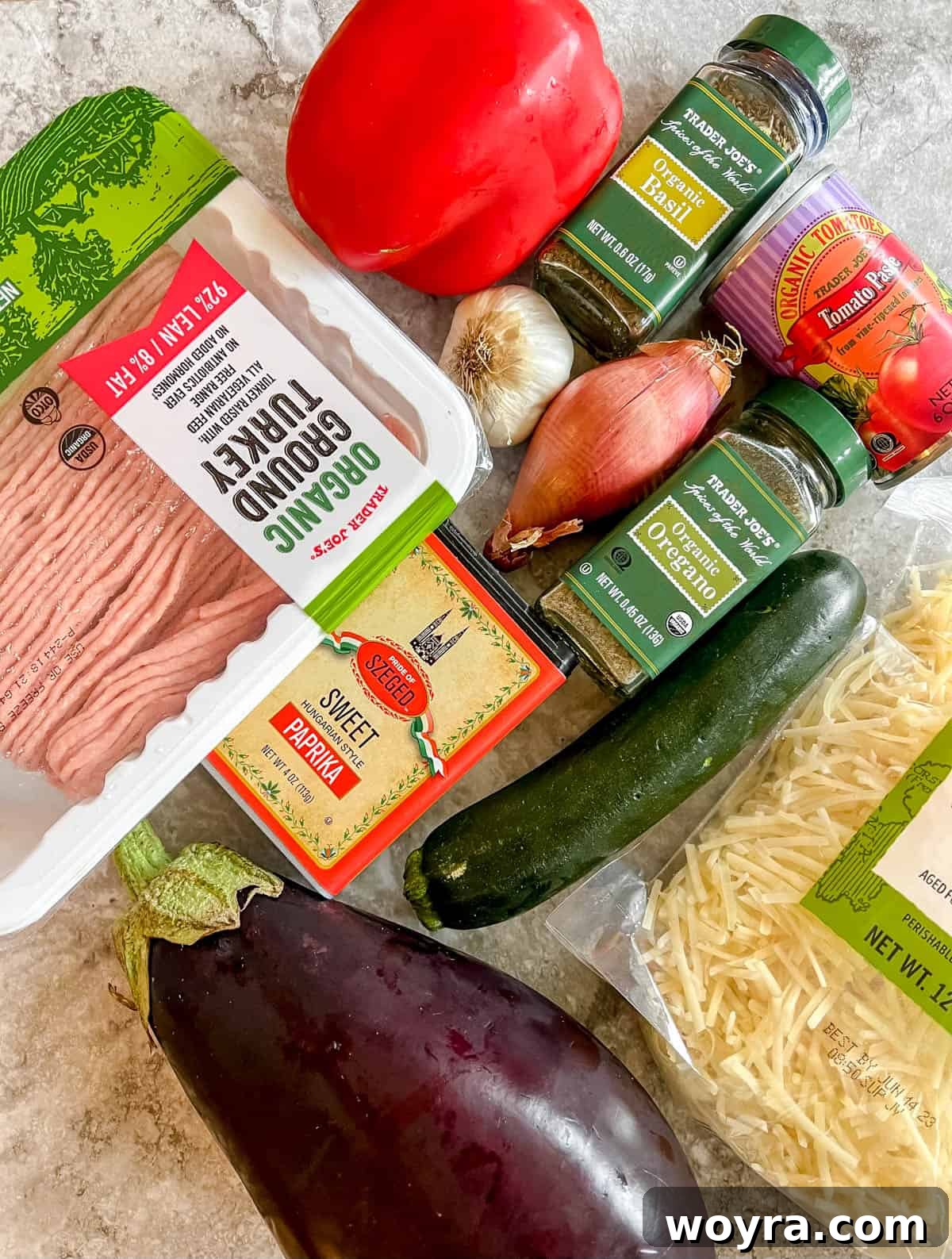 Summer Harvest Turkey Casserole 3 Ingredients needed to make this eggplant ground turkey recipe, including fresh vegetables, ground turkey, and spices.