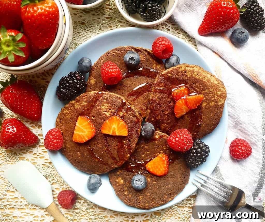 Decadent Paleo Chocolate Pancakes 2 Treat your taste buds and your body to these Chocolatey Cocoa Paleo Pancakes (Gluten-Free) - a healthy, delicious breakfast idea